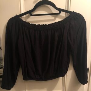 Black off the shoulder crop top.
